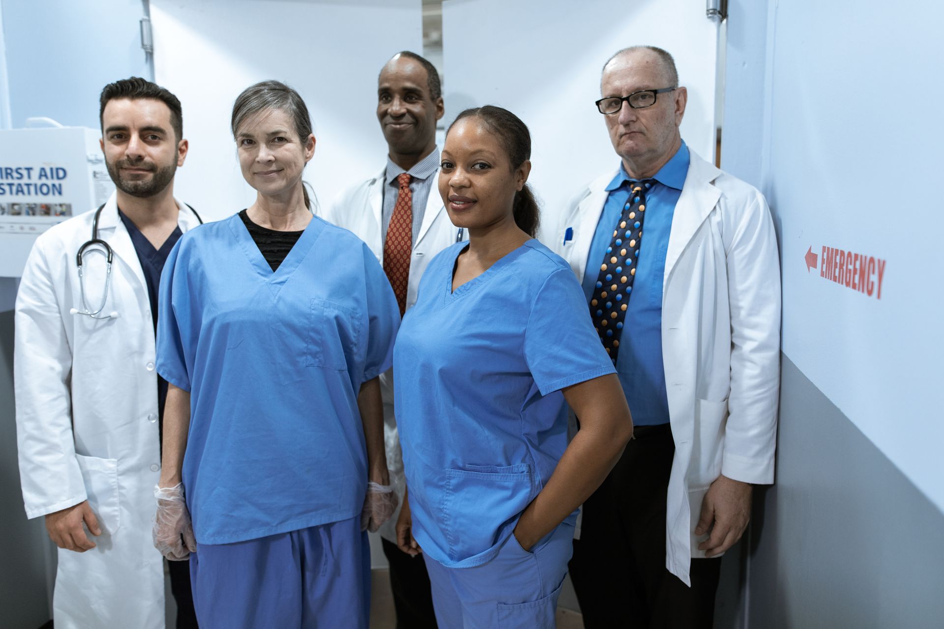 A diverse team of healthcare professionals in a hospital