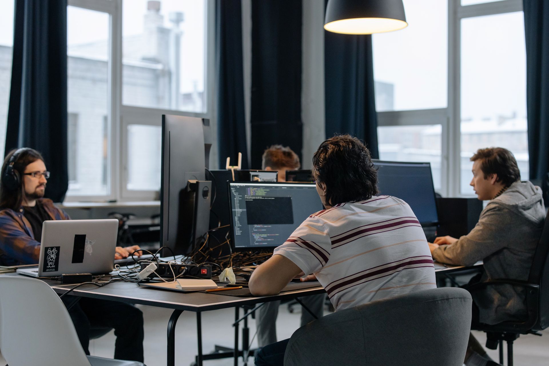A development team collaborating in a modern tech office